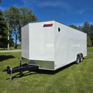 Tandem-axle white enclosed cargo trailer